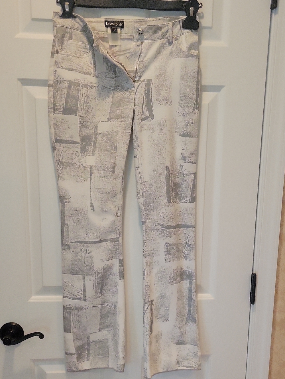 Bebe White and Gray Abstract Print Flared Pants